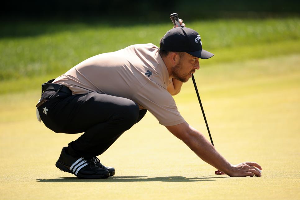 CROMWELL, CONNECTICUT - JUNE 21: Xander Schauffele of the United States lines up a putt on the third green during the second round of the Travelers Championship at TPC River Highlands on June 21, 2024 in Cromwell, Connecticut. (Photo by James Gilbert/Getty Images)